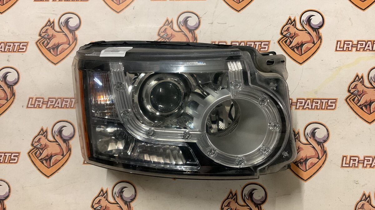 LR023544 Reflektor Lewy LAND ROVER DISCOVERY 4 używany